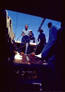 President Nixon at the wheel on a boating trip - NARA - 194299