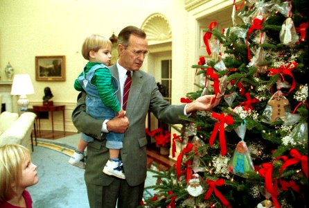 President George H. W. Bush Shows his Grandson, Walker, the Oval Office Christmas Tree photo