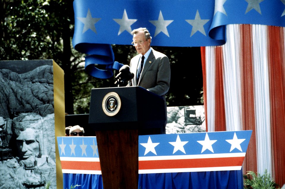 President George H. W. Bush speaks during the 50th anniversary of the dedication of Mount Rushmore