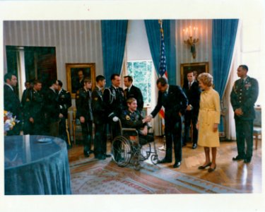 President Richard and Pat Nixon Greet Veteran Servicemen and Servicewomen prior to Sharing a Thanksgiving Luncheon Together