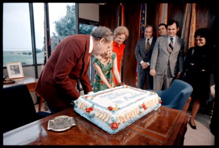 President Richard Nixon Admires His 61st Birthday Cake while Celebrating with Family and Staff Members at the Western White House (01) photo