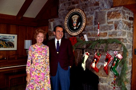 President Richard Nixon and First Lady Pat Nixon beside a Camp David Fireplace photo