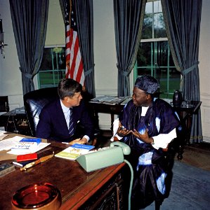 President John F. Kennedy meets with William H. Fitzjohn, Charge d'Affairs of Sierra Leone