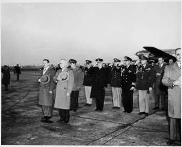 President Prio Socarras of Cuba (left) and President Truman at attention at National Airport in Washington, D. C.... - NARA - 200029 photo