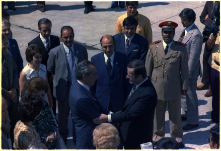 President Hafez al-Assad of Syria greets President Nixon on his arrival at Damascus airport - NARA - 194584