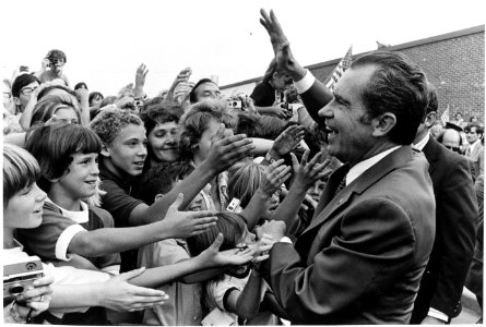 President Richard Nixon Greets a Crowd of Students outside a Building at Dwight D. Eisenhower High School in Utica, Michigan after Attending a School Dedication Ceremony photo