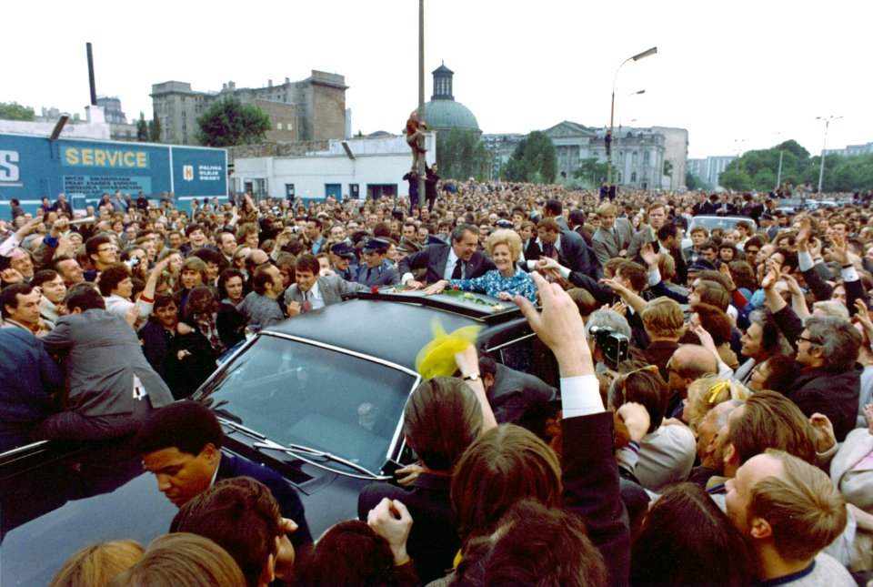 President Richard Nixon and First Lady Pat Nixon greeted by enthusiastic crowds in Warsaw, Poland