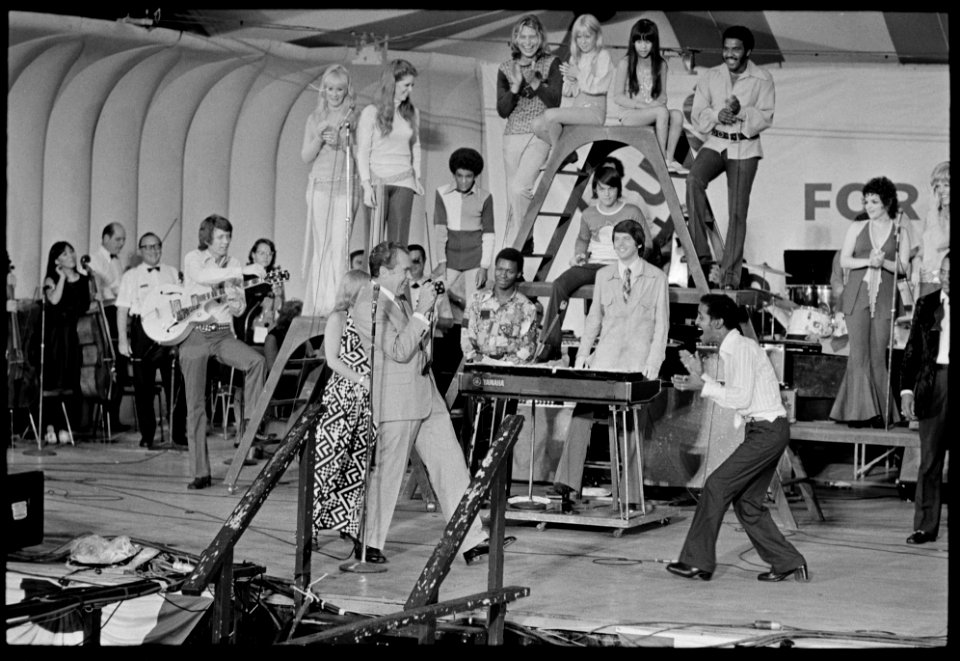 President Richard Nixon takes Photographs of Sammy Davis, Jr