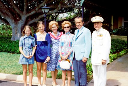 President Richard Nixon and Pat Nixon Stand with Rear Admiral Paul Pugh and his Family Outside their Residence in Agana, Guam