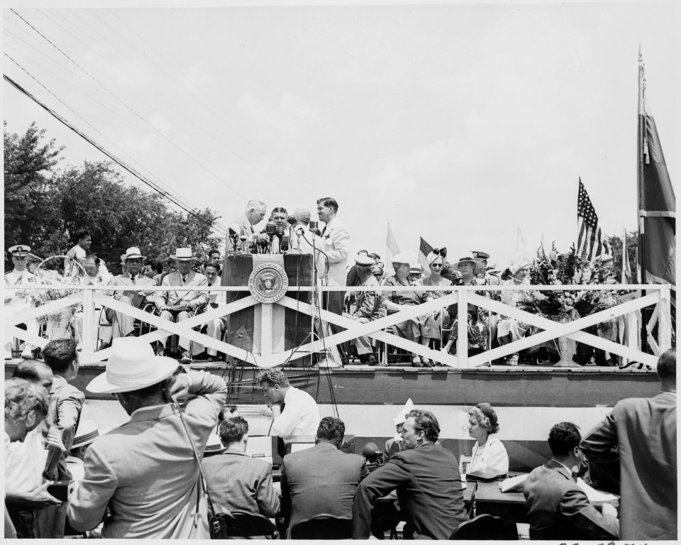 President Harry S. Truman, President Romulo Gallegos of Venezuela, and other dignitaries on the reviewing platform in... - NARA - 199912