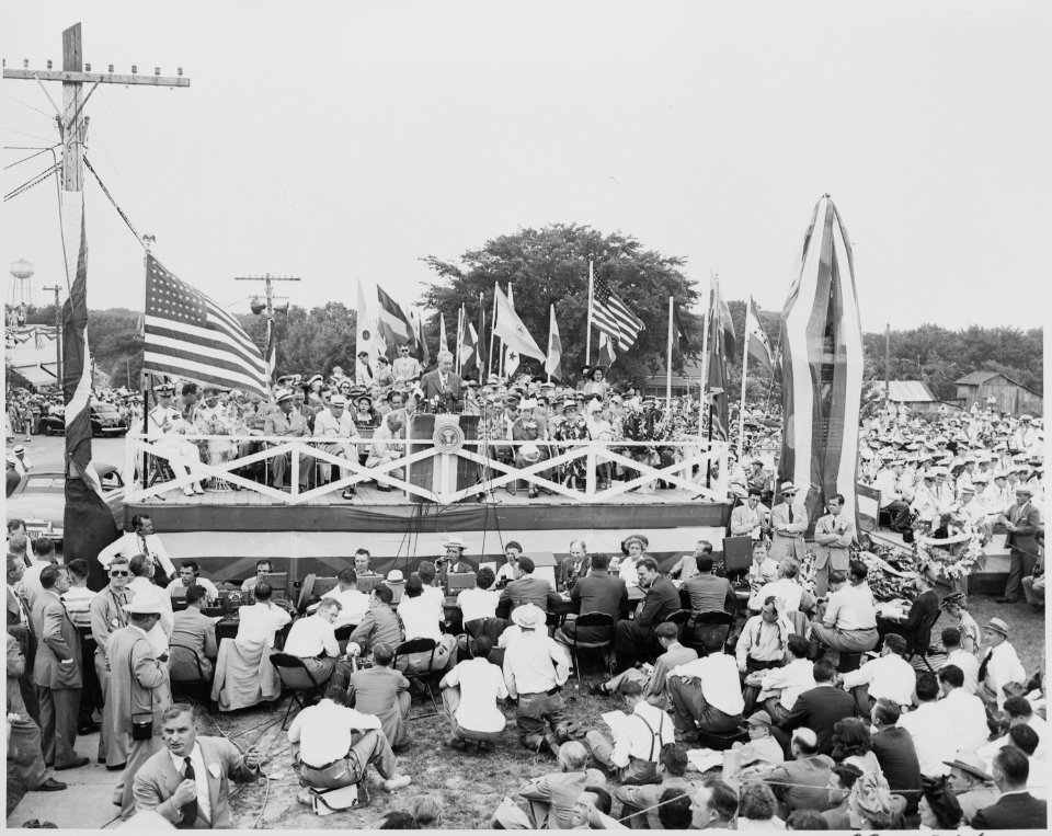 President Harry S. Truman, President Romulo Gallegos of Venezuela, and other dignitaries on the reviewing platform... - NARA - 199919