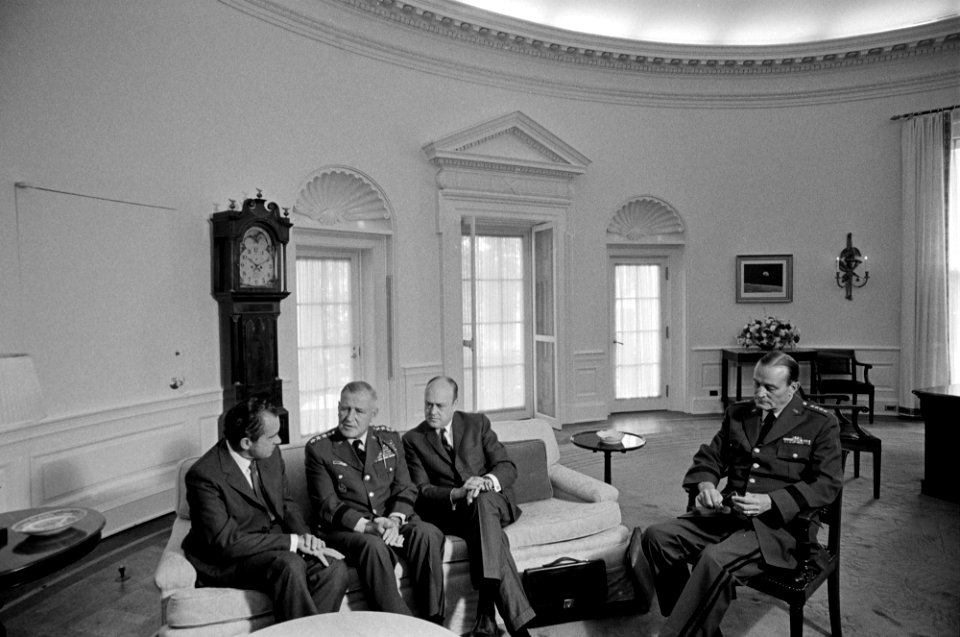 President Richard Nixon, General Creighton Abrams, General Earle Wheeler and Secretary of Defense Melvin Laird conferring about the situation in Vietnam