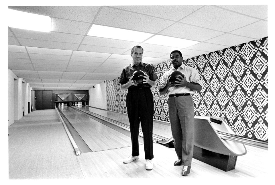 President Richard Nixon bowling with Frank Blair in the White House bowling alley