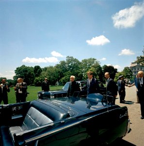 President John F. Kennedy and President Dr. Sarvepalli Radhakrishnan of India Walk to Car Before Motorcade