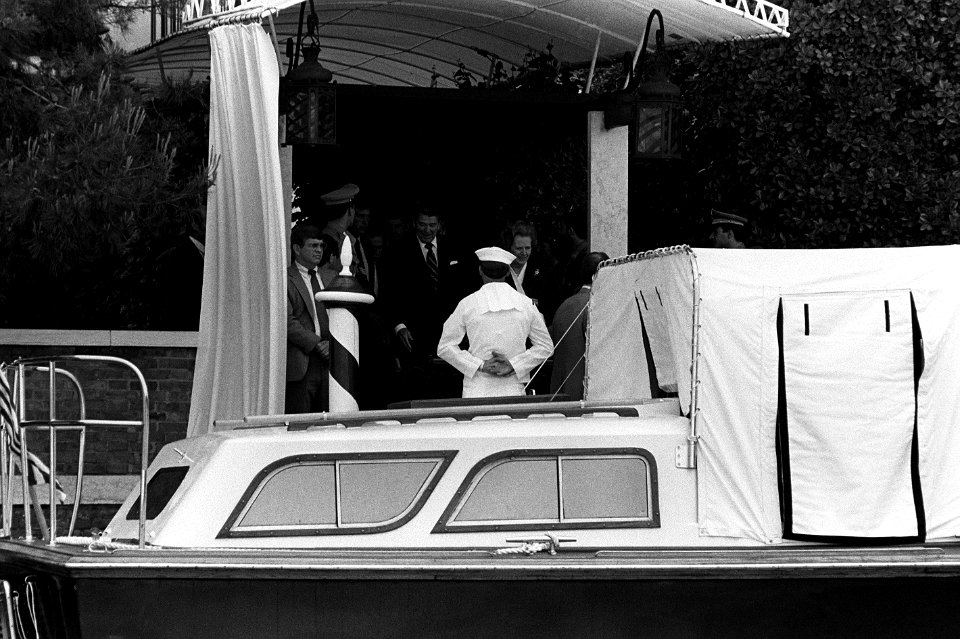 President Ronald Reagan and British Prime Minister Margaret Thatcher prepare to board the presidential barge during the seven-nation economic summit
