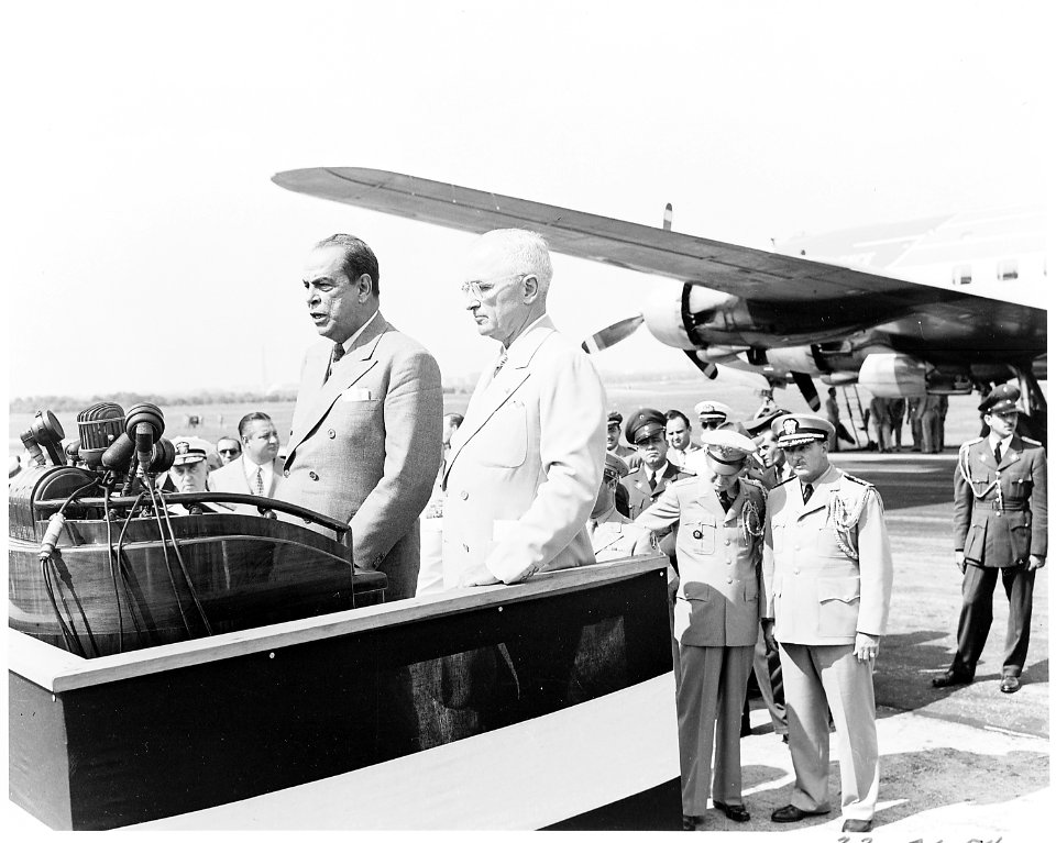 President Romulo Gallegos of Venezuela and President Truman at a podium at the airport where President Gallegos has... - NARA - 199812