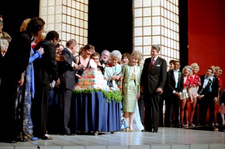 President Ronald Reagan and Nancy Reagan Cutting The Cake During a Tribute to Bob Hope photo