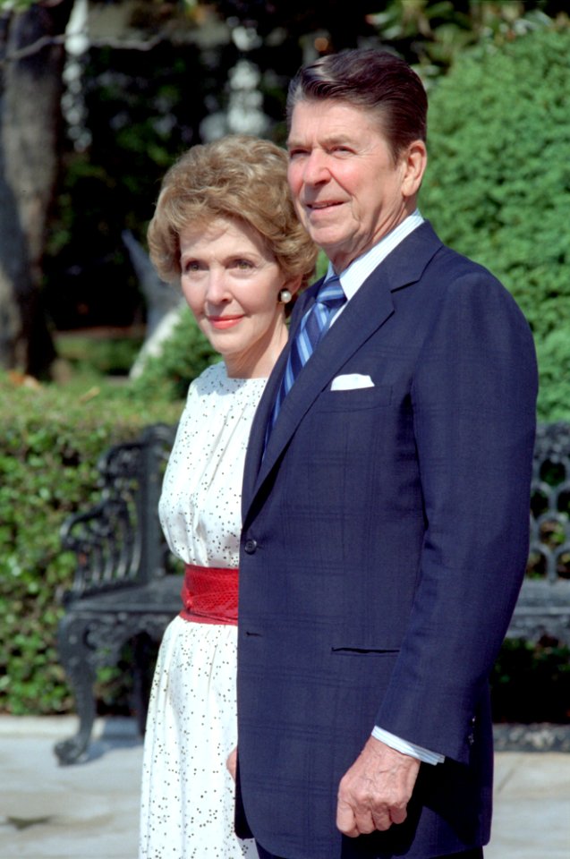 President Ronald Reagan and Nancy Reagan waiting for the arrival of President Figueiredo of Brazil at the White House Diplomatic entrance