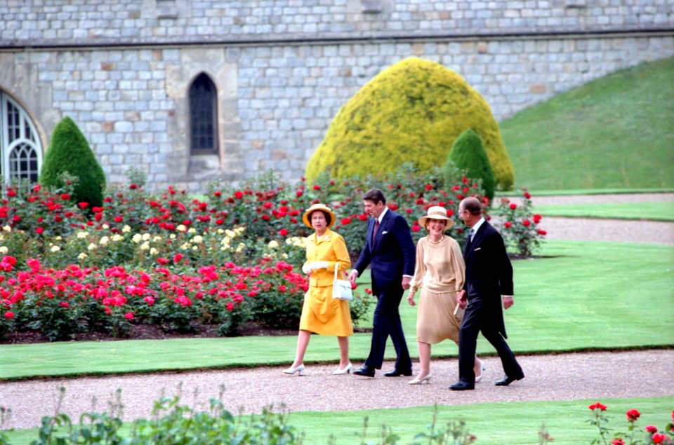 President Ronald Reagan and Nancy Reagan walking with Queen Elizabeth II and Prince Philip