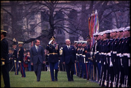 President Nixon and Prime Minister Nihat Erim of the Republic of Turkey reviewing the troops at the welcoming ceremony... - NARA - 194431 photo