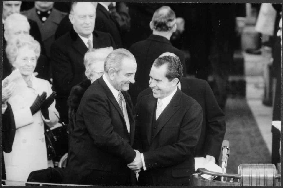 President Lyndon Baines Johnson shakes hands with President-elect Richard M. Nixon - NARA - 194602