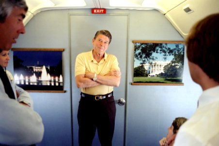 President Ronald Reagan aboard Air Force One returning from a trip to California