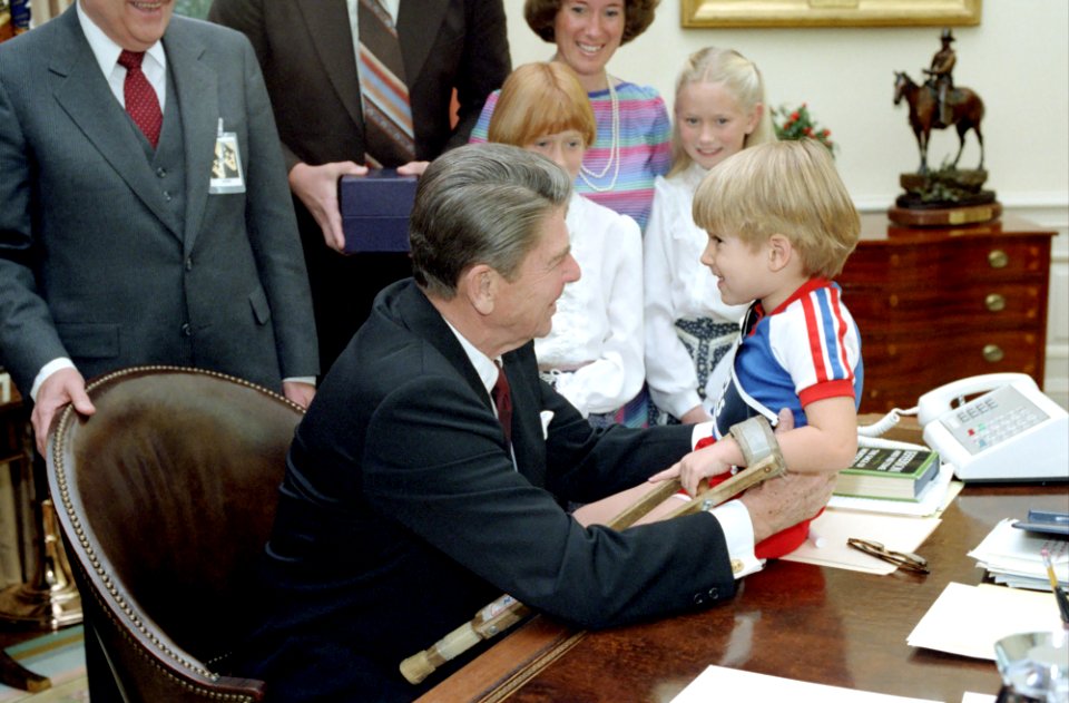 President Ronald Reagan hugging the 1983 March of Dimes Poster Child