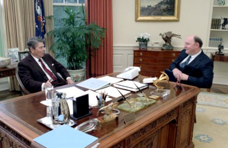 President Ronald Reagan meeting with Marlin Fitzwater in the Oval Office photo