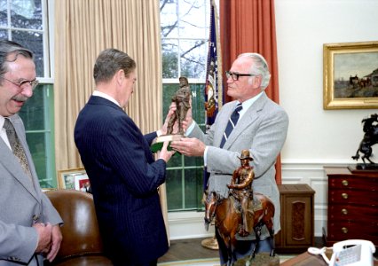 President Ronald Reagan meeting with Senator Barry Goldwater and Ray Renfroe