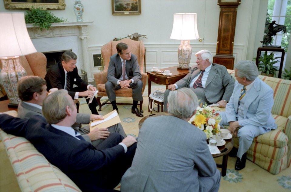 President Ronald Reagan and George H. W. Bush meet with Democratic Congressional Leadership to discuss Tax Bill