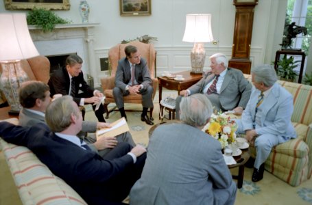 President Ronald Reagan and George H. W. Bush meet with Democratic Congressional Leadership to discuss Tax Bill
