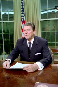 President Ronald Reagan making an address to the nation on the Iran-Contra Controversy in Oval Office