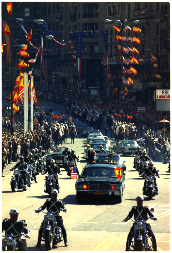 President Nixon waves to the crowd during a procession in Madrid, Spain - NARA - 194332