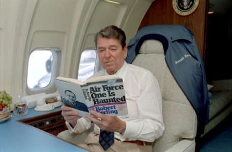 President Ronald Reagan reading Air Force One is Haunted aboard Air Force One