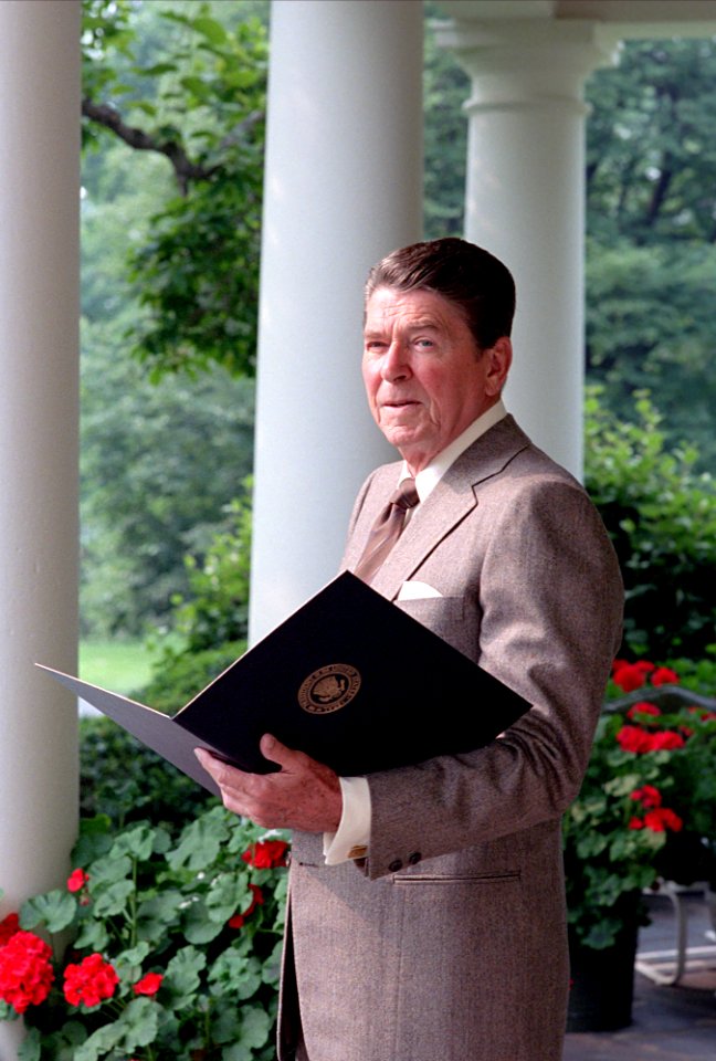 President Ronald Reagan reading on the Colonnade