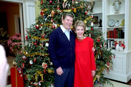 President Ronald Reagan and Nancy Reagan at the Senior Staff Christmas Party in the East Room photo