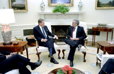 President Ronald Reagan meeting with Richard Perle in the Oval Office photo