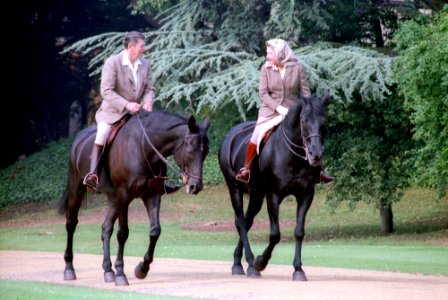 President Ronald Reagan riding horses with Queen Elizabeth II during visit to Windsor Castle