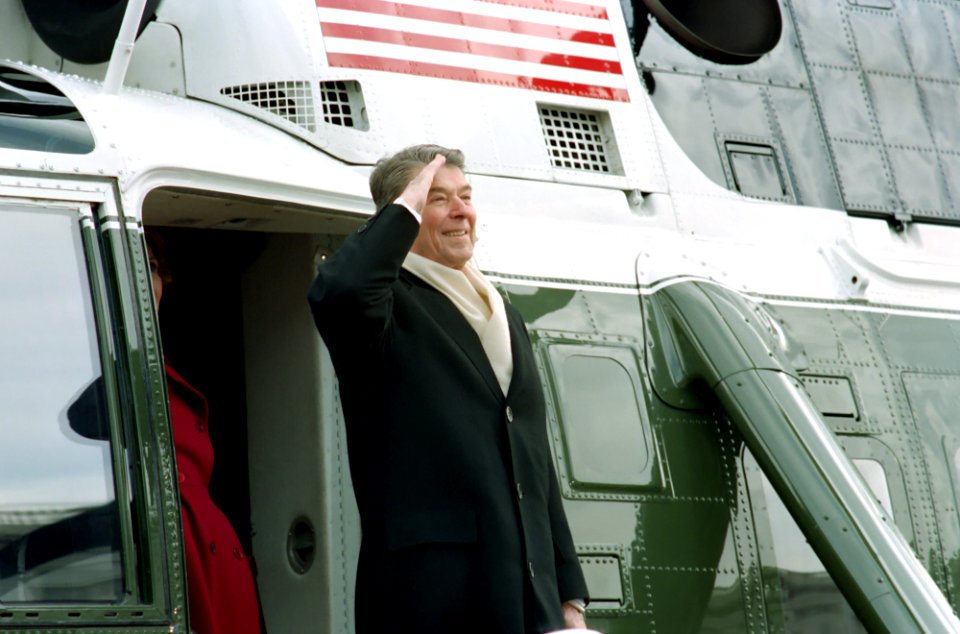 President Ronald Reagan salutes as he departs aboard a helicopter from the United States Capitol