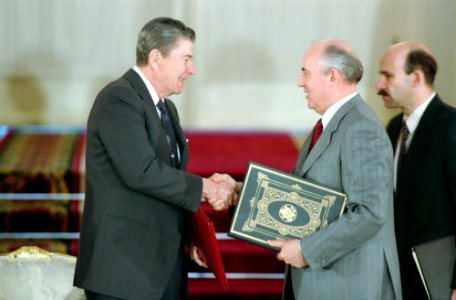 President Ronald Reagan shaking hands with Mikhail Gorbachev photo