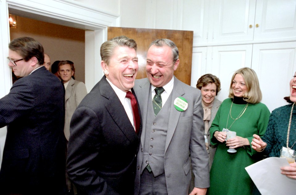 President Ronald Reagan sharing a joke with Ed Hickey