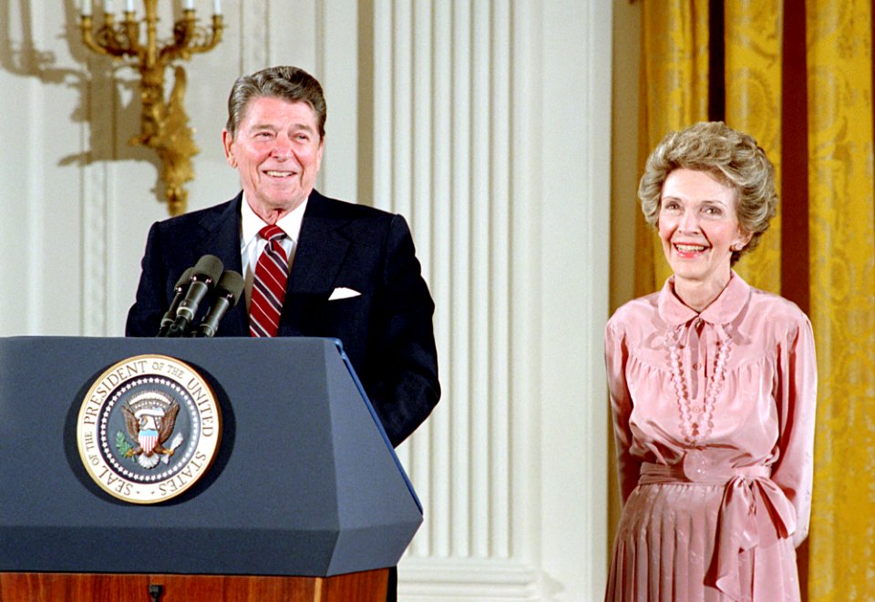 President Ronald Reagan and Nancy Reagan hosting a luncheon for the 1986 President's Volunteer Action Award Recipients in the East Room