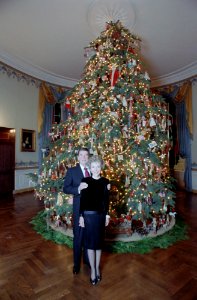 President Ronald Reagan and Nancy Reagan posing for photos with White House Christmas Tree in the Blue Room photo