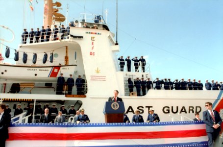 President Ronald Reagan speaking at a podium in Miami Beach, Florida photo