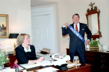 President Ronald Reagan receiving Boss of the Year gift from Kathy Osborne photo