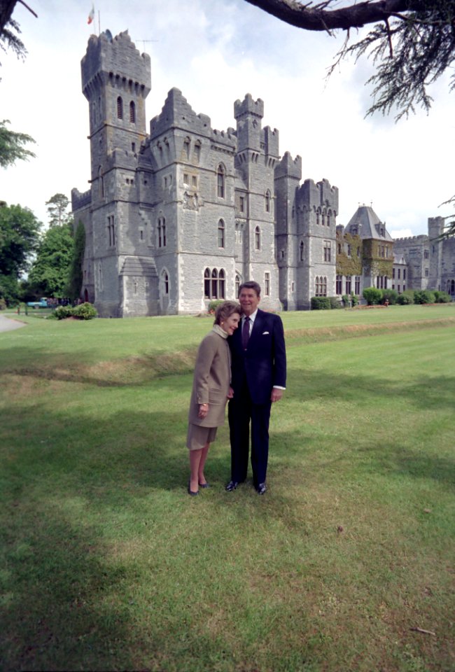 President Ronald Reagan and Nancy Reagan standing in front of Ashford Castle in Ireland