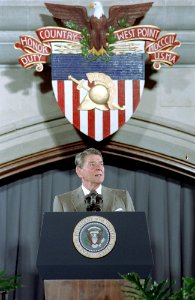 President Ronald Reagan speaking at the podium during a trip to West Point