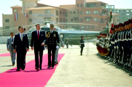 President Ronald Reagan reviewing troops with President Miguel de la Madrid at the Camino Real Hotel landing zone in Mazatlan, Mexico