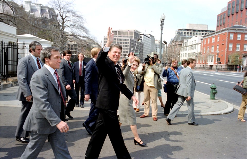 President Ronald Reagan and Nancy Reagan walk with agent Bob DeProspero to St. John's Episcopal Church