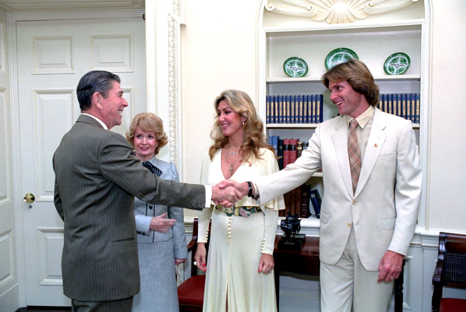 President Ronald Reagan shaking hands with Bruce Jenner